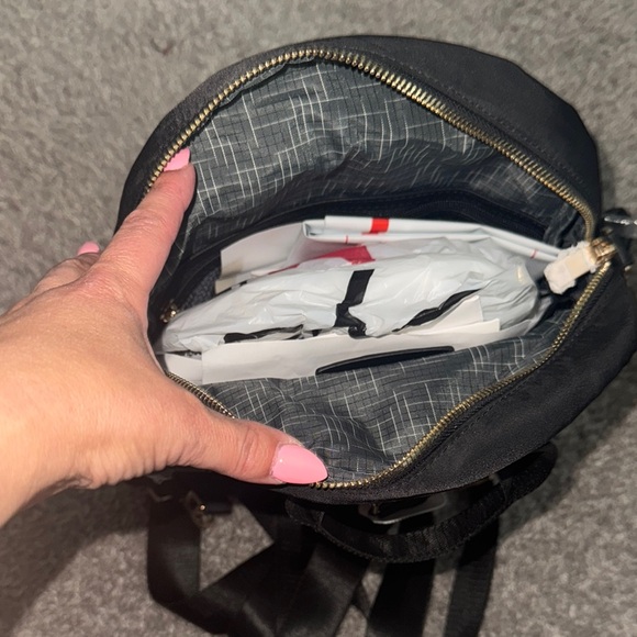 Sleek Black Backpack with Gold Zippers - Picture 8 of 10